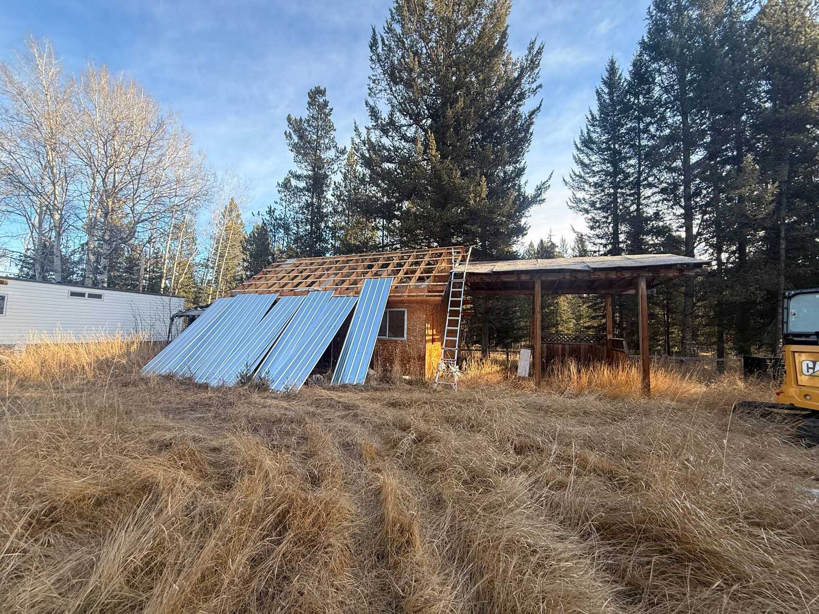 Old structure before demolition and site clearing in 100 Mile House